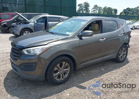 2014 Hyundai Santa Fe Sport 2.4L z USA, uszkodzony, nr VIN 5XYZT3LB8EG211915